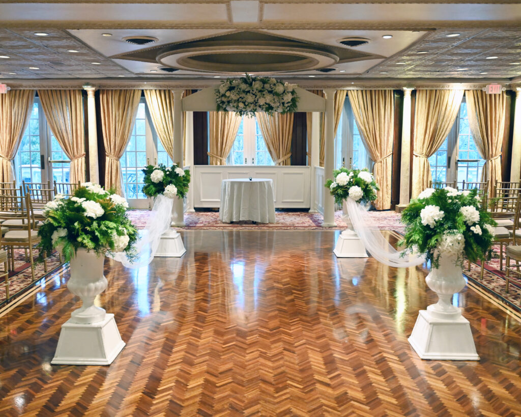 Indoor ceremony setup in Westbury Manor ballroom Long Island wedding venue