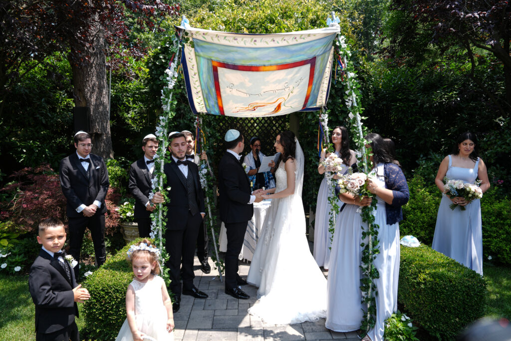 Bride standing in doorway at Westbury Manor mansion Long Island wedding