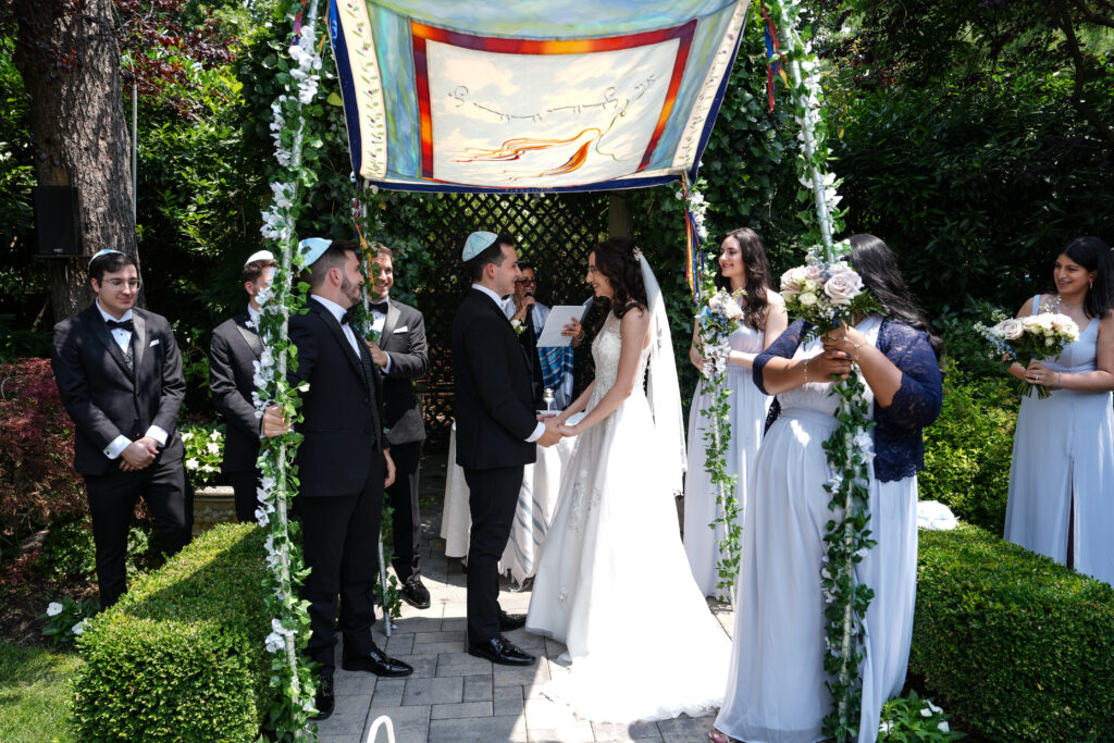 Jewish ceremony under Huppah Westbury Manor