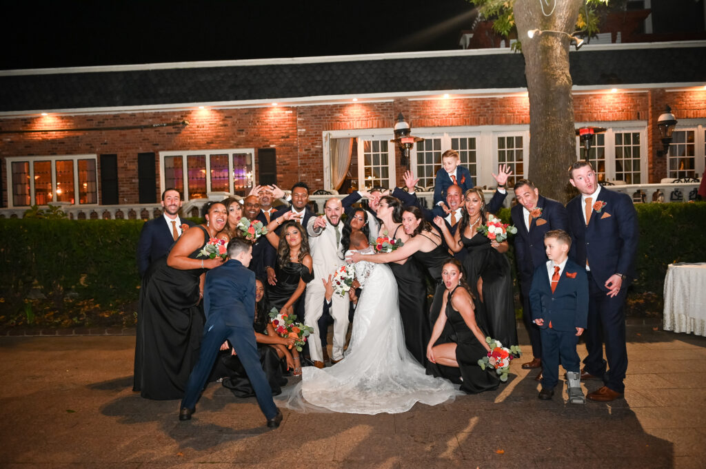 Wedding guests celebrating on dance floor at Westbury Manor Long Island