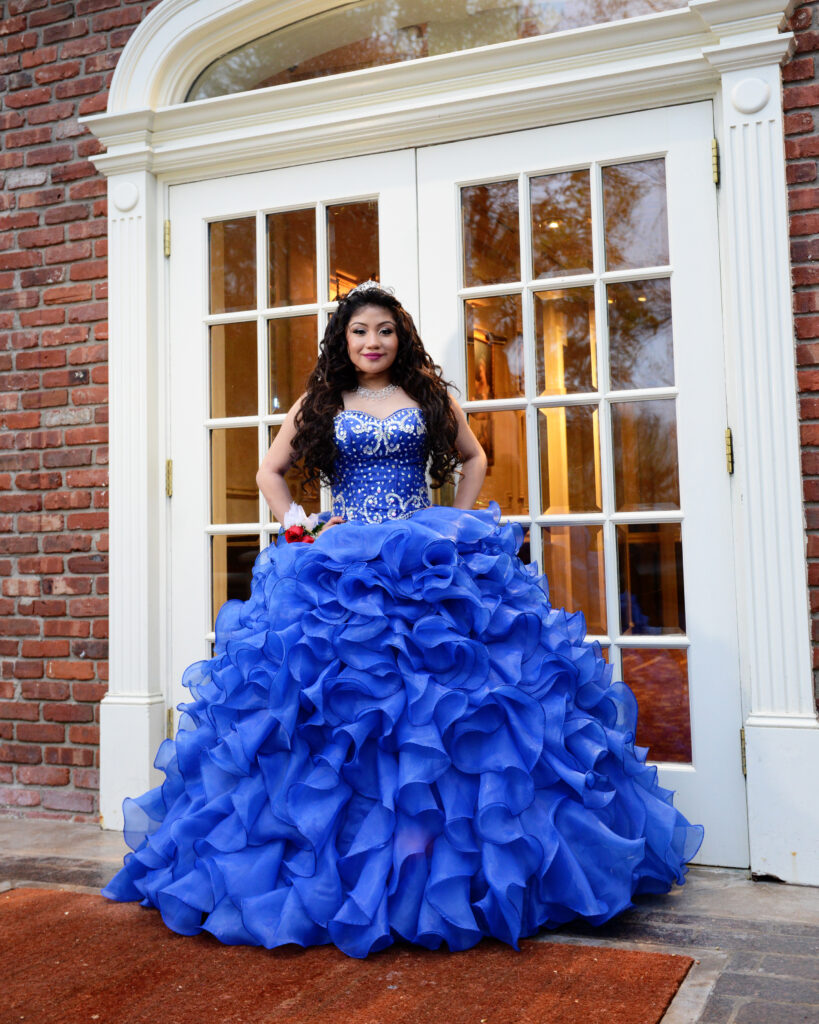 Quinceañera portrait in front of Westbury Manor mansion doors Long Island
