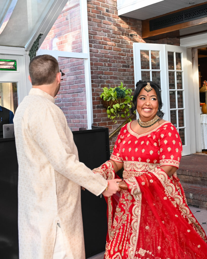 South Asian bride entering ceremony at Westbury Manor Long Island wedding