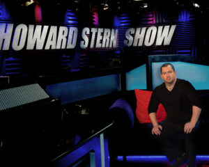 Teaching and mentoring at the highest levels—experience that benefits every couple we photograph. Doug Gordon in The Howard Stern Show studio set.