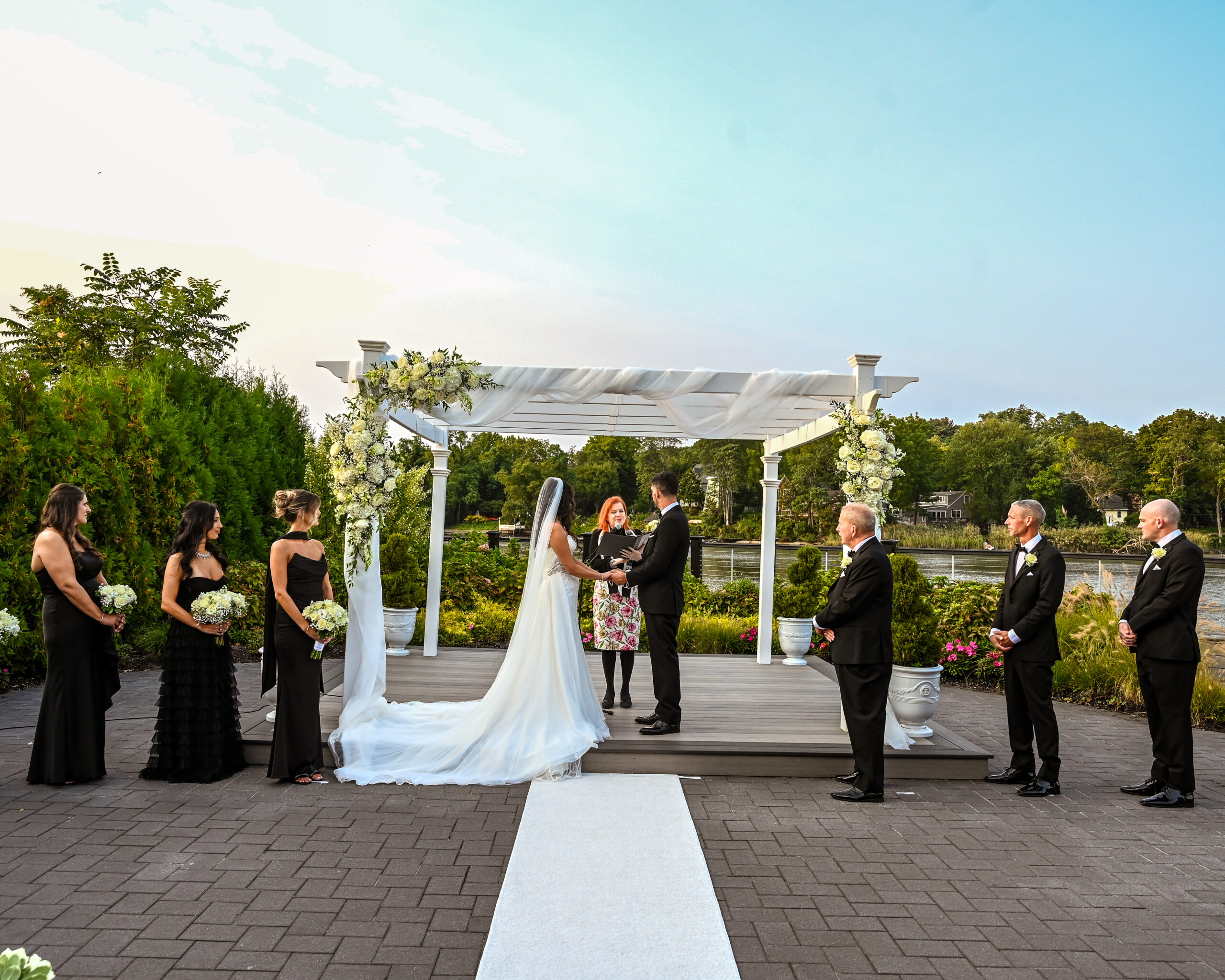 Wedding party group portrait outdoors at Flowerfield St. James NY