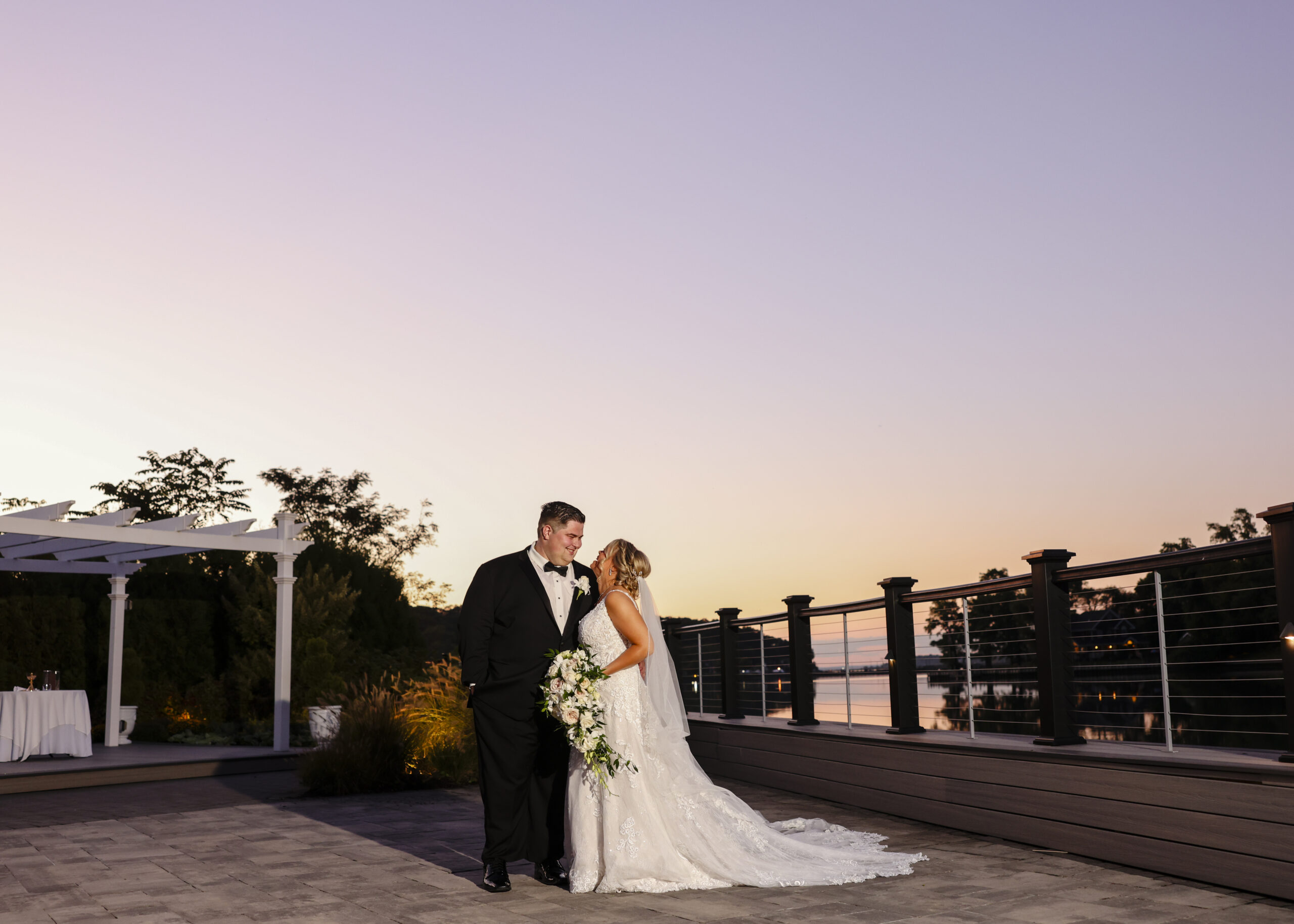 Land’s End wedding photographer documenting bride and groom by the Great South Bay